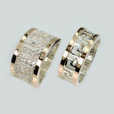 Пара обручальных колец из серебра с золотом