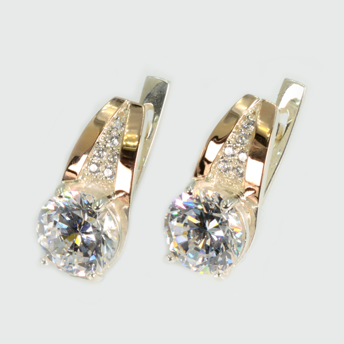 Срібні сережки з золотими вставками