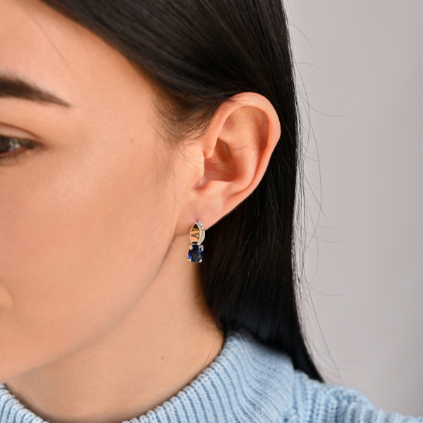 Срібні сережки з золотими вставками