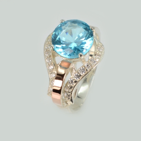 Срібна каблучка з накладками з золота