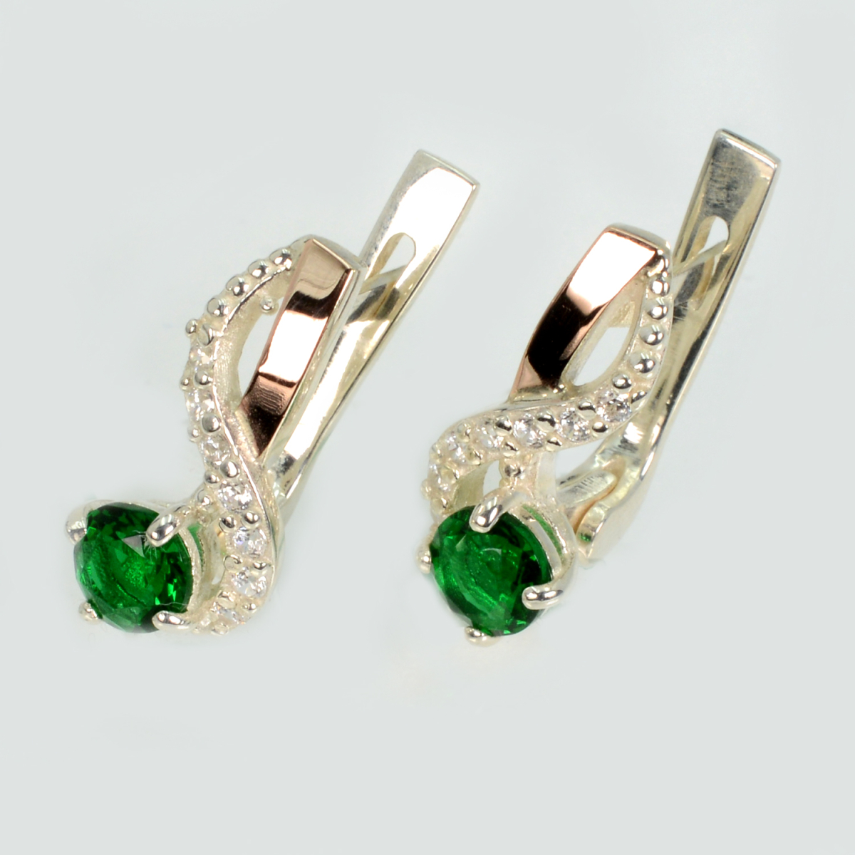 Срібні сережки з золотими напайками