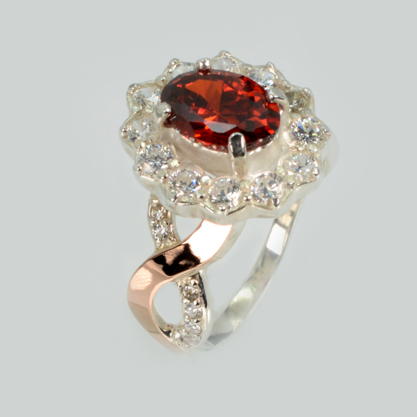 Срібна каблучка з золотими вставками