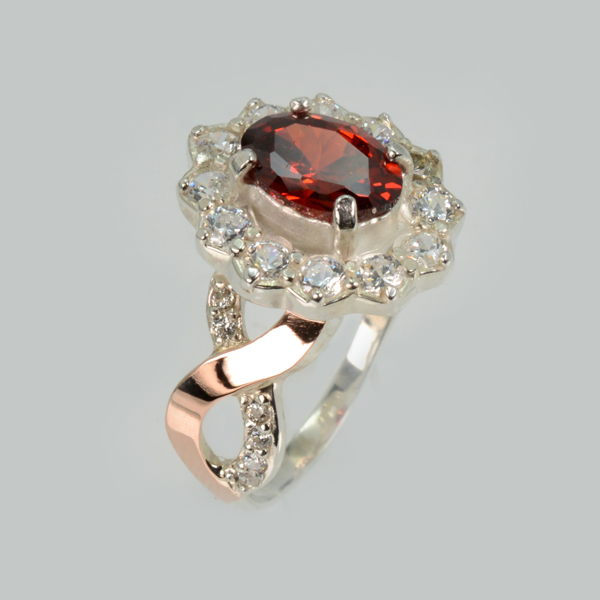 Срібна каблучка з золотими вставками