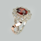 Срібна каблучка з золотими вставками