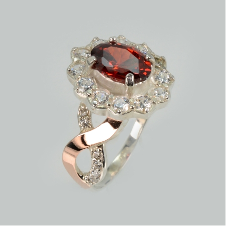 Срібна каблучка з золотими вставками