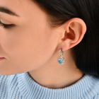 Срібні сережки з золотими напайками