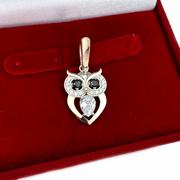 Срібна підвіска з пластинами золота