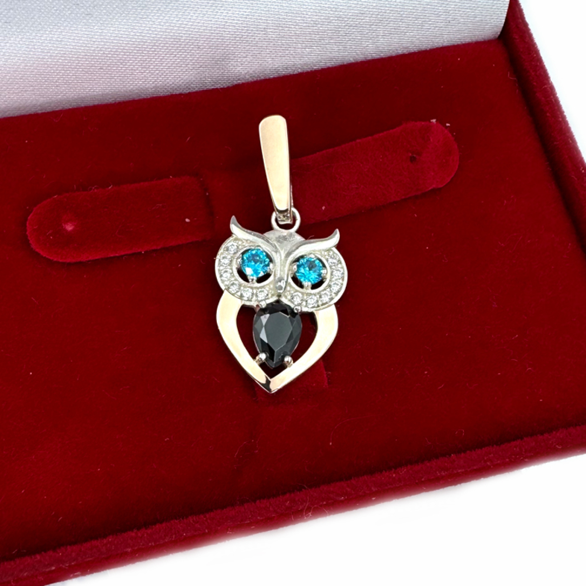 Срібна підвіска з пластинами золота