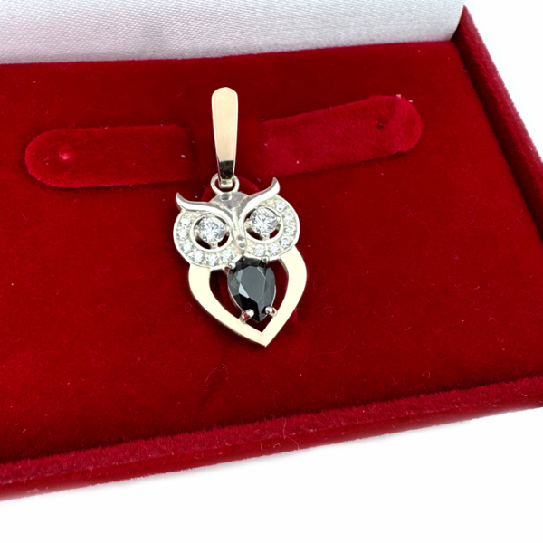 Срібна підвіска з пластинами золота