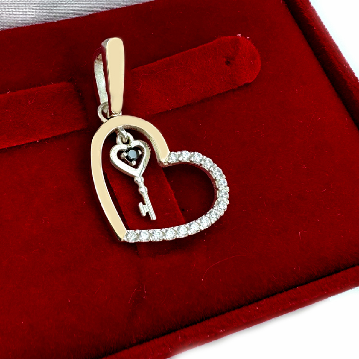 Срібна підвіска з пластинами золота