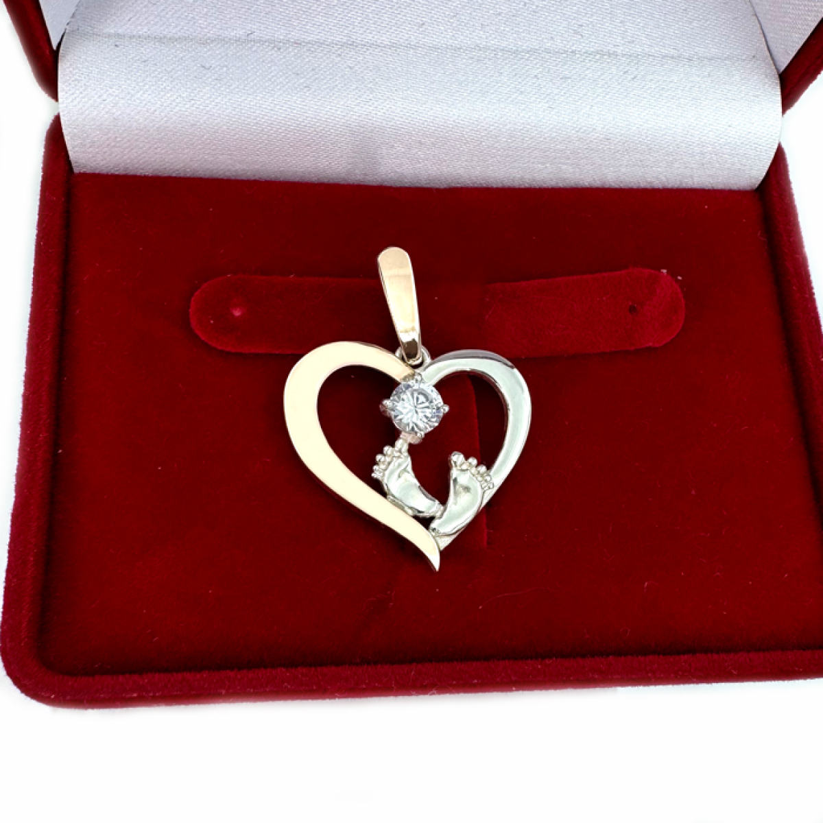 Срібна підвіска з пластинами золота