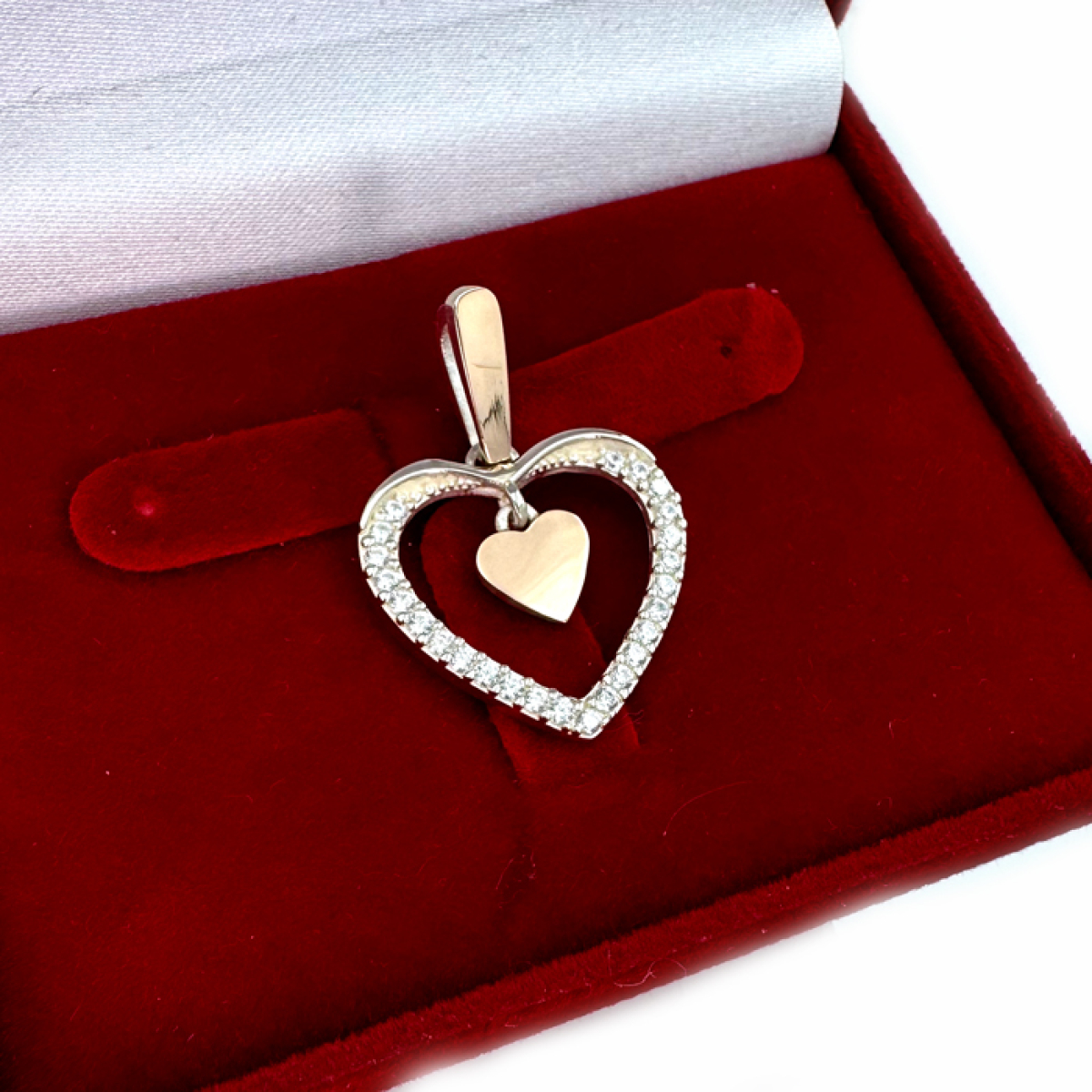 Срібна підвіска з пластинами золота