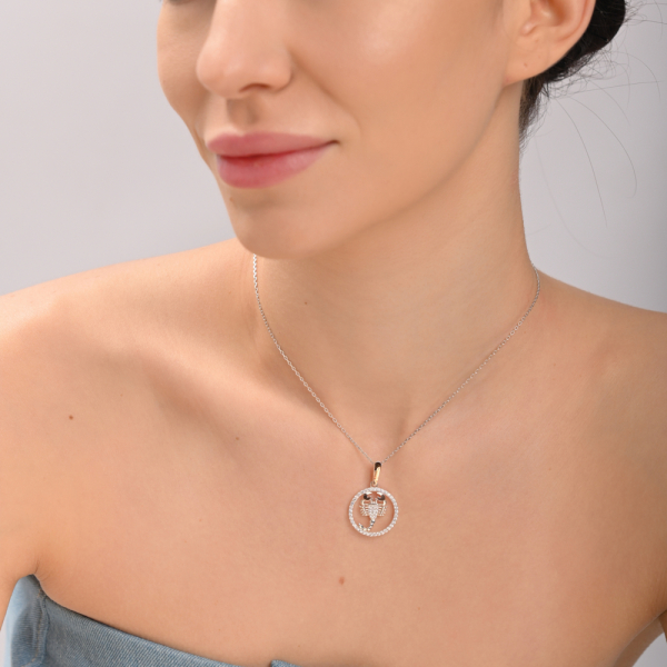 Підвіска знак зодіаку "Скорпіон" срібна з пластинами золота