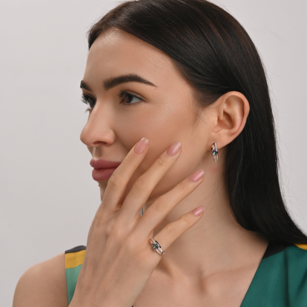 Срібне кільце з золотими вставками