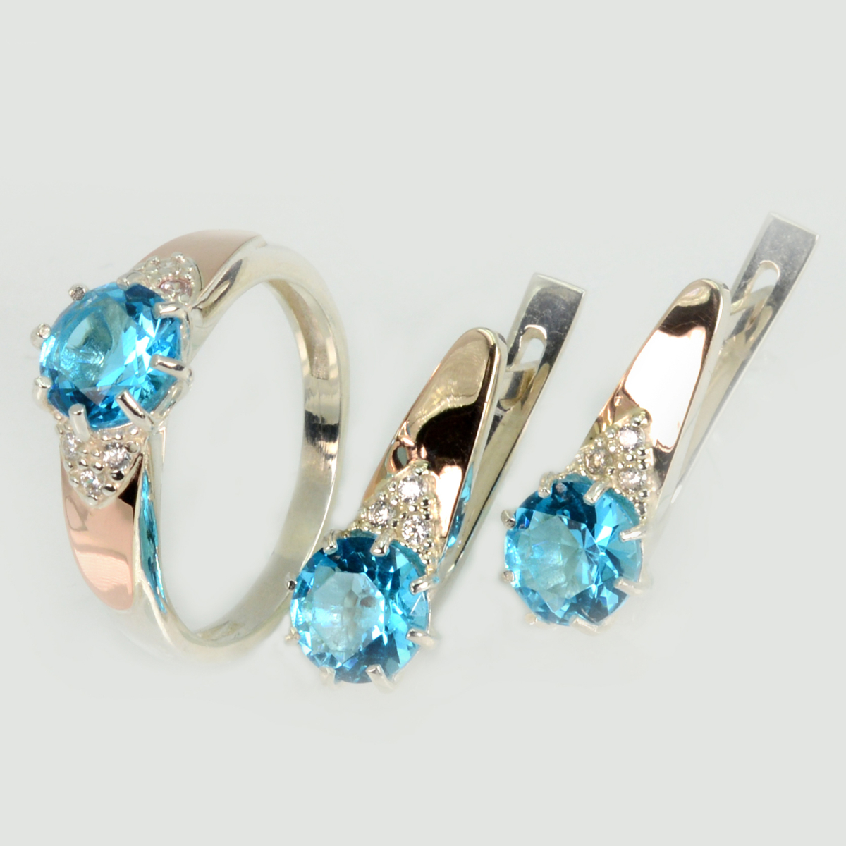 Срібний набір з золотими вставками