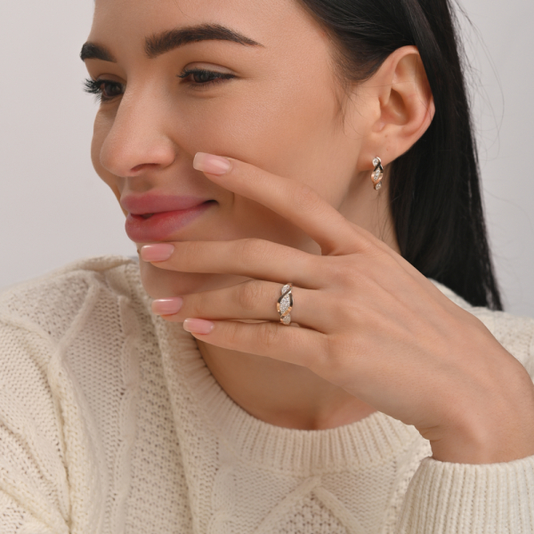 Срібне кільце з золотими пластинами