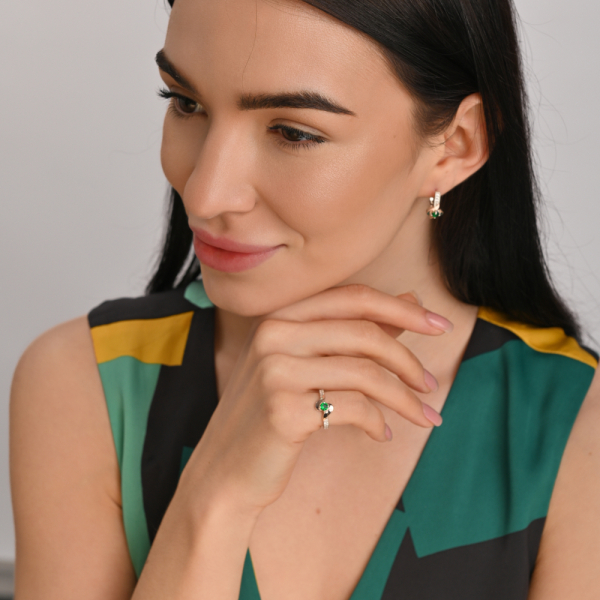 Срібне кільце з золотими вставками