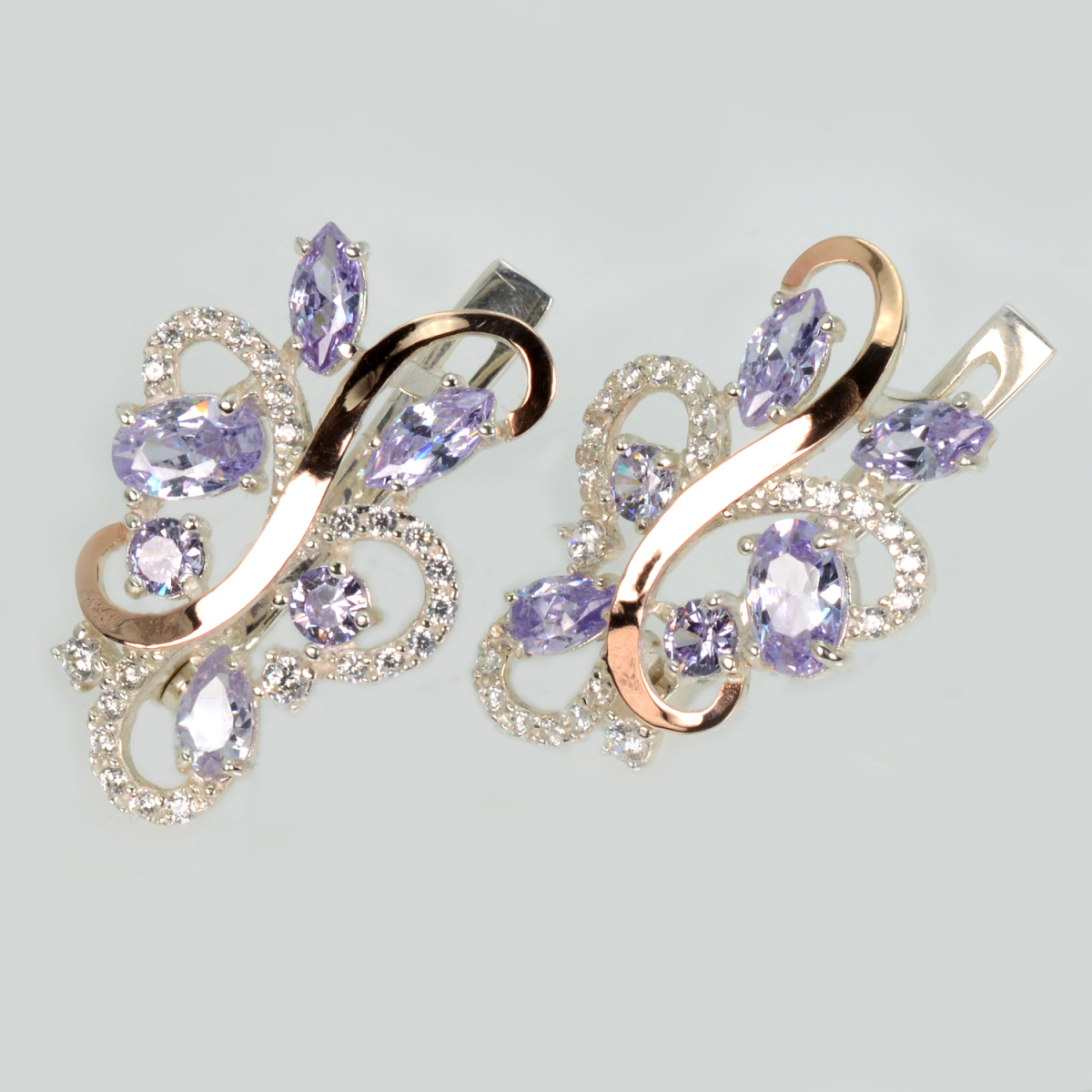 Срібні сережки з золотими вставками