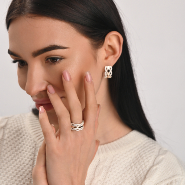 Срібна каблучка з золотими вставками