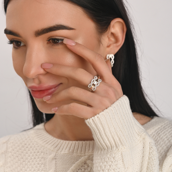 Срібна каблучка з золотими вставками