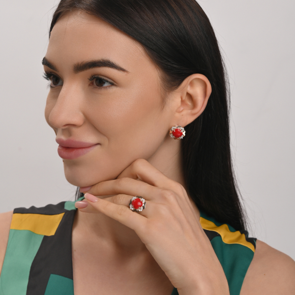 Срібна каблучка з золотими вставками