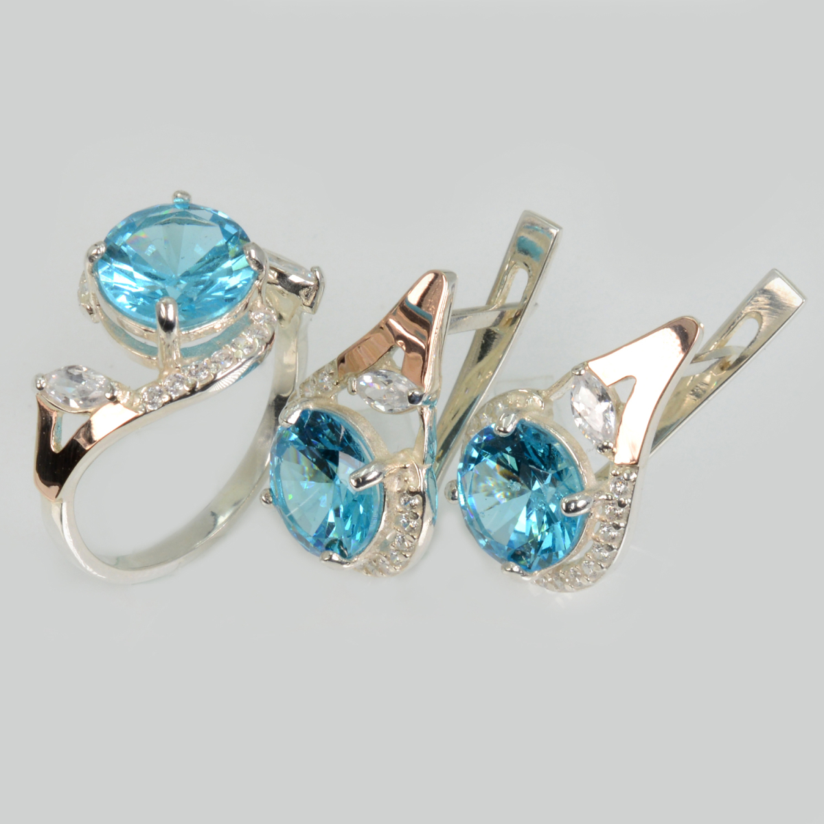 Срібний набір з золотими пластинами