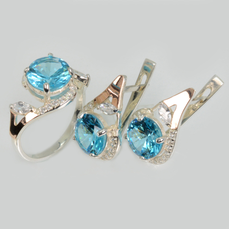 Срібний набір з золотими пластинами