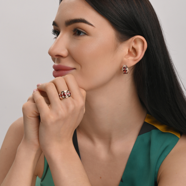 Срібна каблучка з золотими вставками