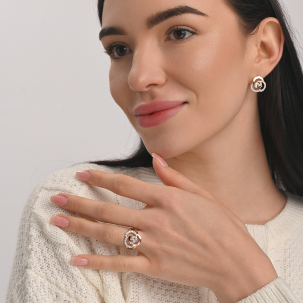 Срібна каблучка з золотими вставками