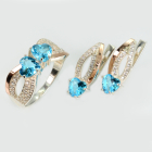 Срібний набір з золотими пластинами