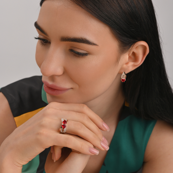 Срібна каблучка з золотими вставками