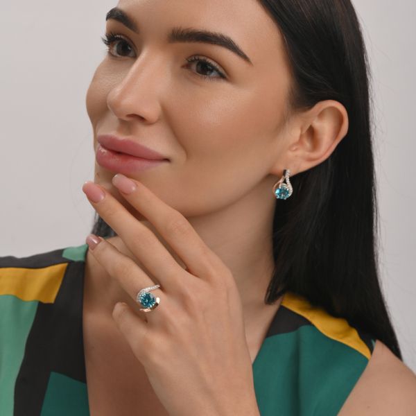 Срібна каблучка з золотими вставками