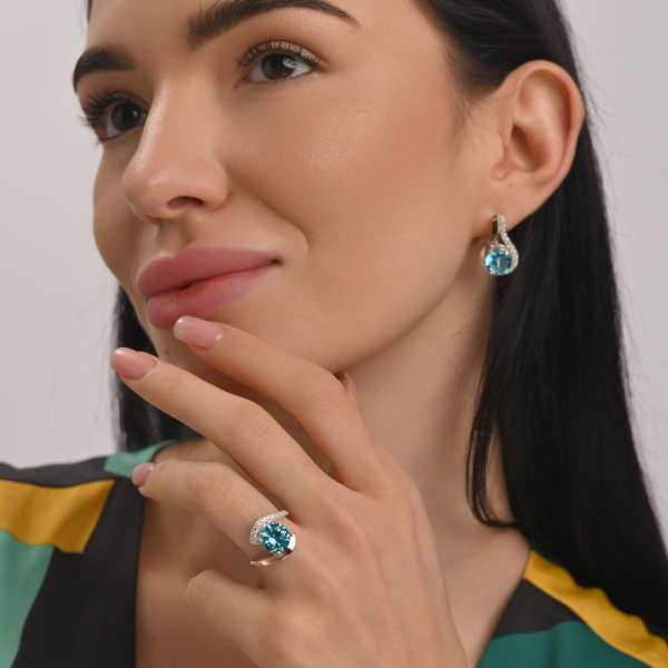 Срібна каблучка з золотими вставками