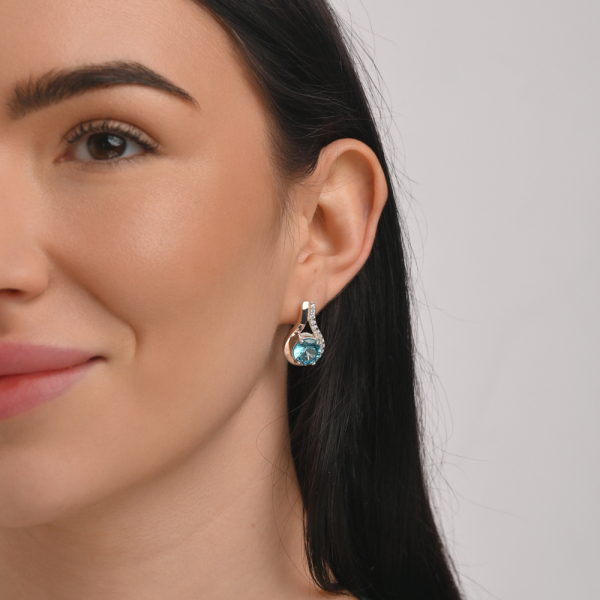 Срібні сережки з золотими пластинами