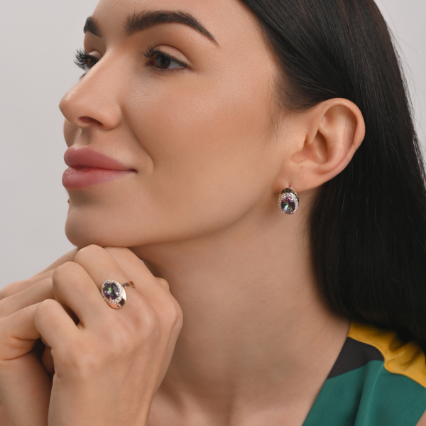 Срібна каблучка з золотими вставками