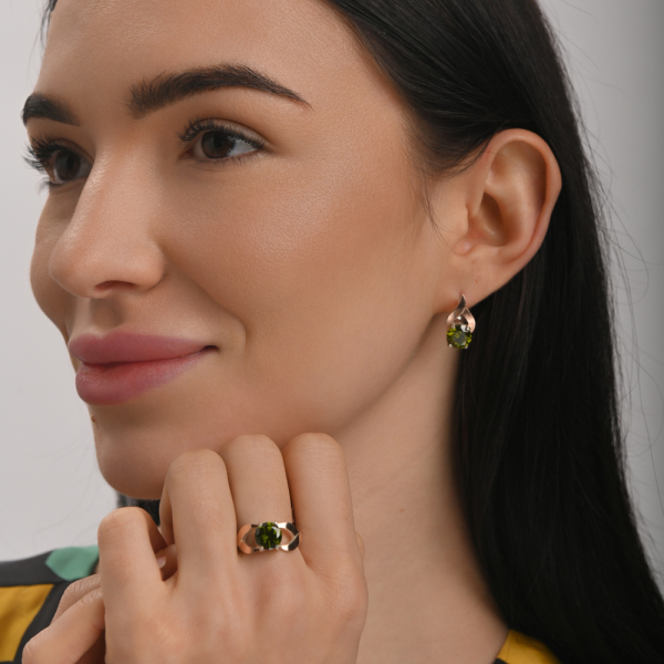 Срібна каблучка з золотими вставками