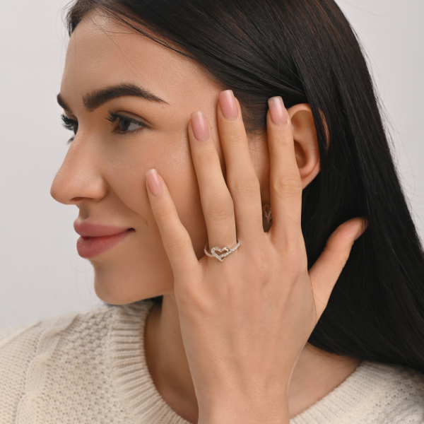 Срібна каблучка з золотими вставками