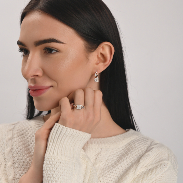 Срібна каблучка з золотими вставками