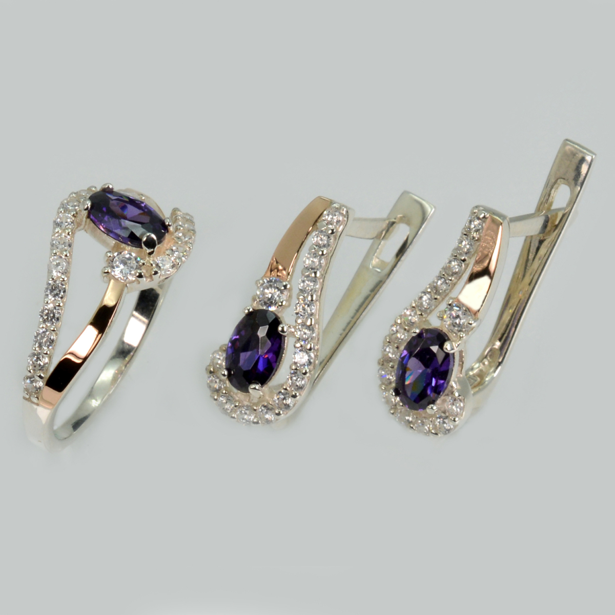 Срібний набір з золотими пластинами