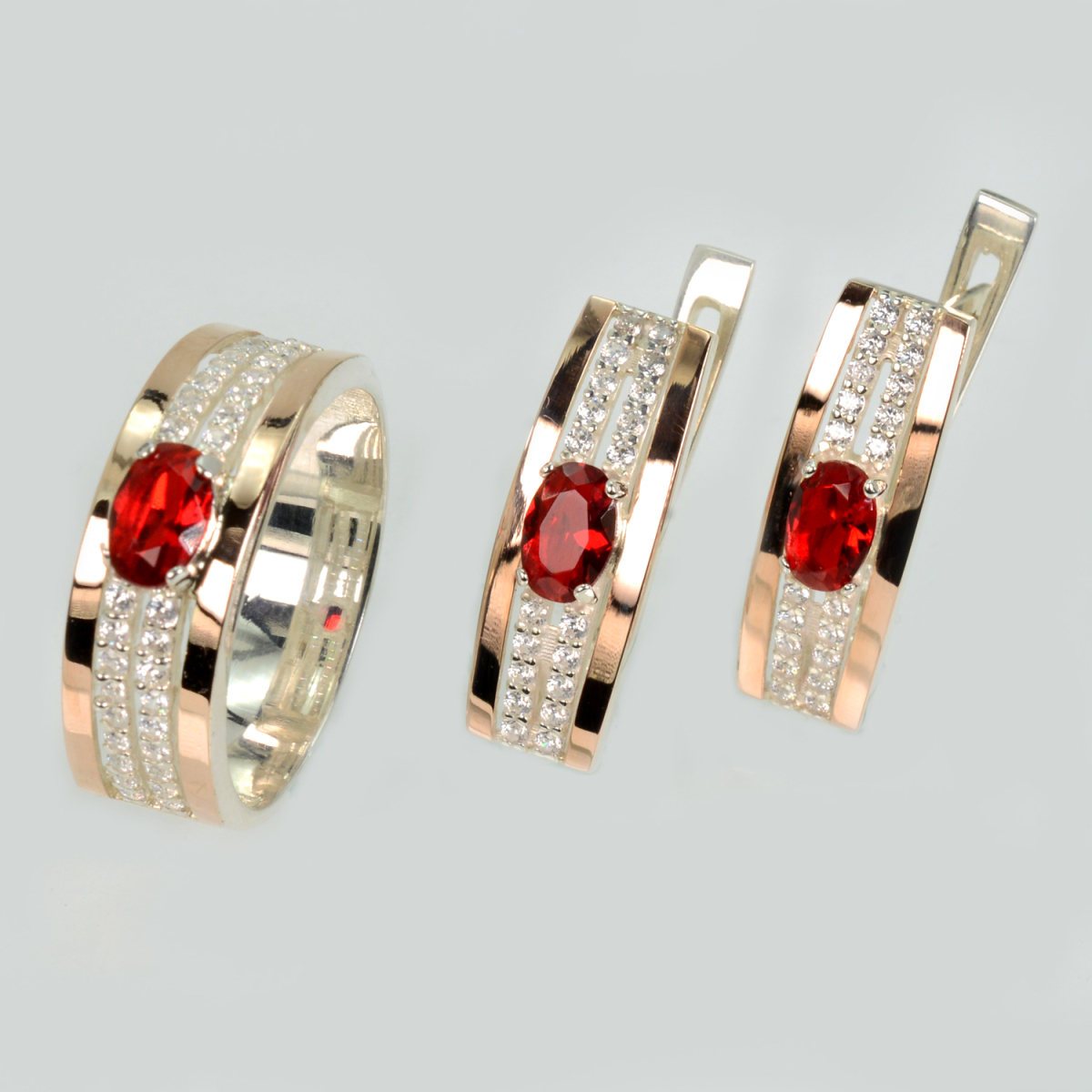 Срібний набір з золотими пластинами