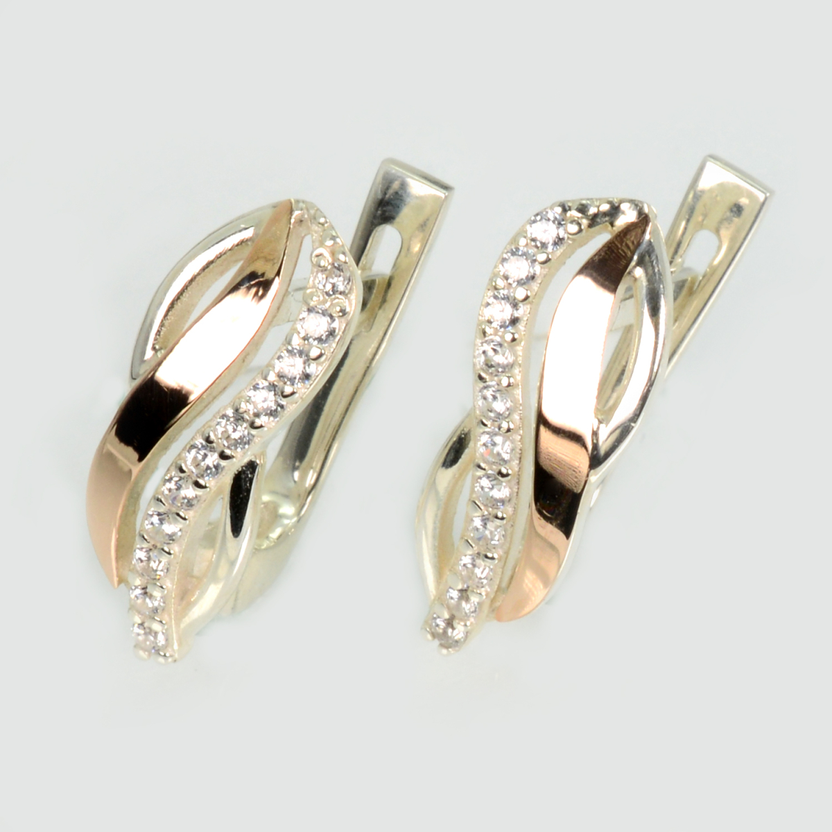 Срібні сережки з золотими пластинами