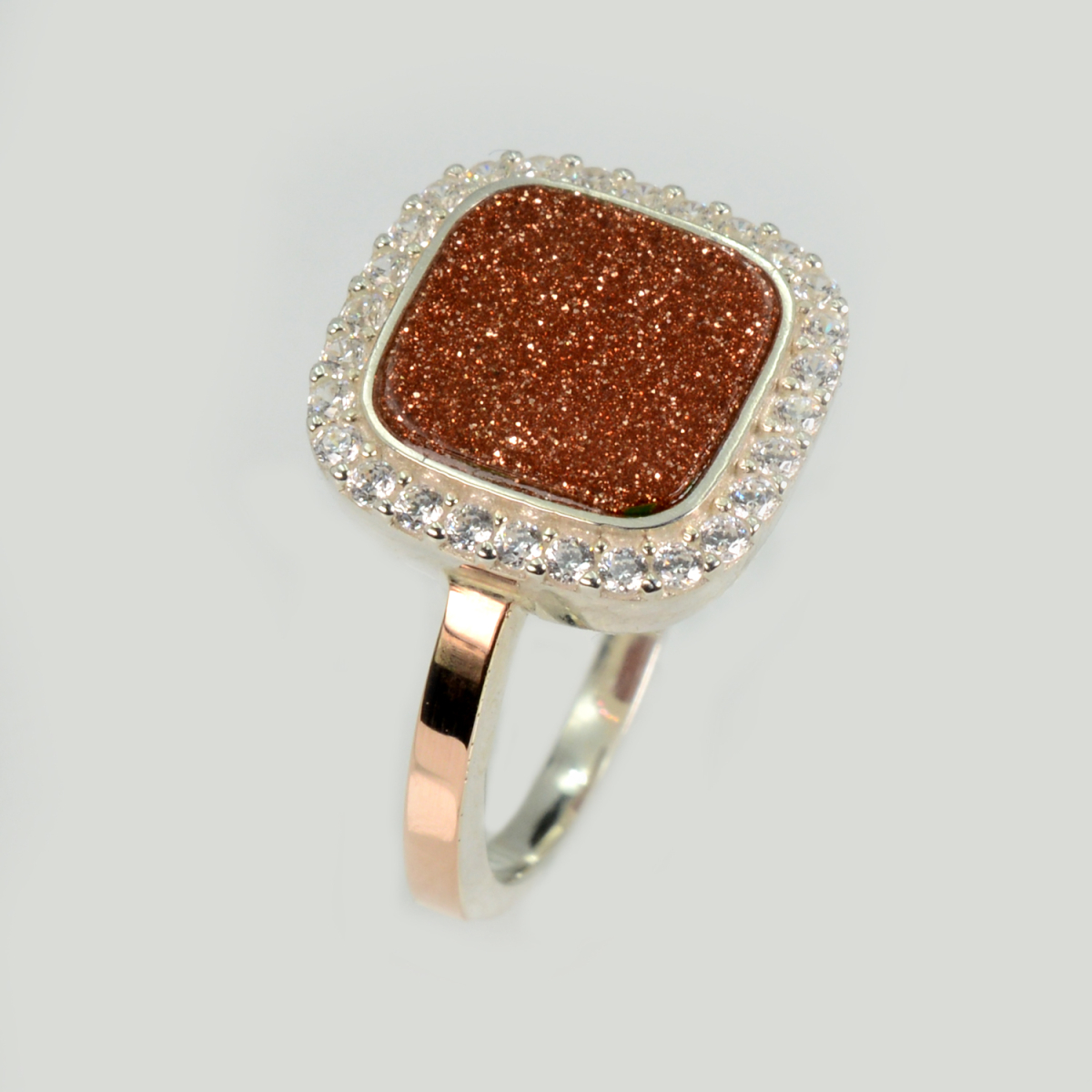 Срібна каблучка з фіанітами та авантюрином