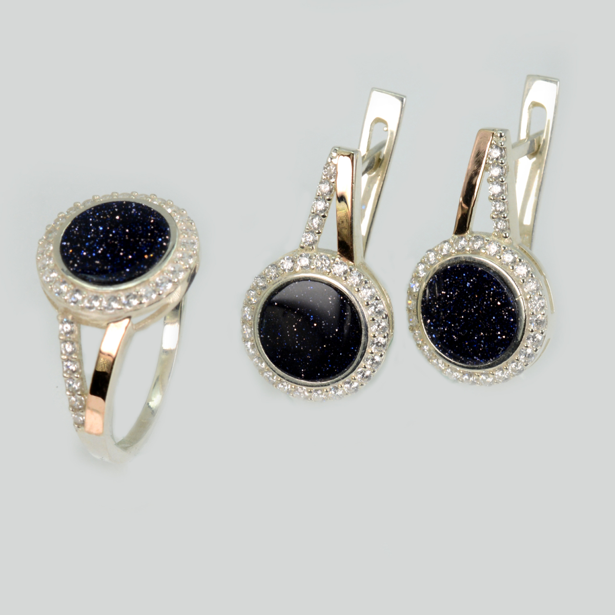 Срібний набір з золотими пластинами