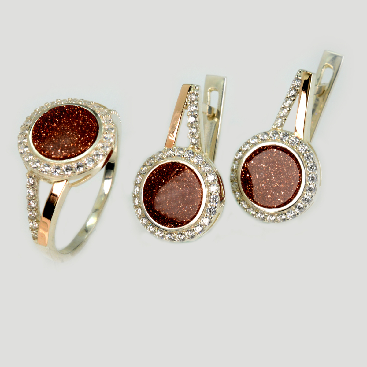 Срібний набір з золотими пластинами