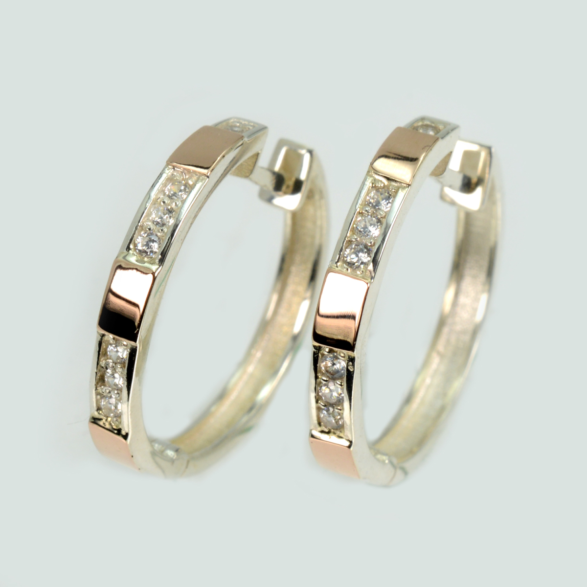 Срібні сережки з золотими вставками