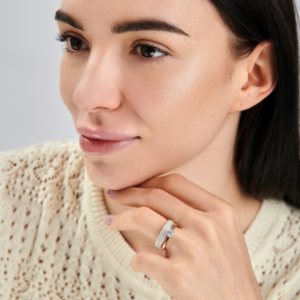 Срібна каблучка з золотими вставками