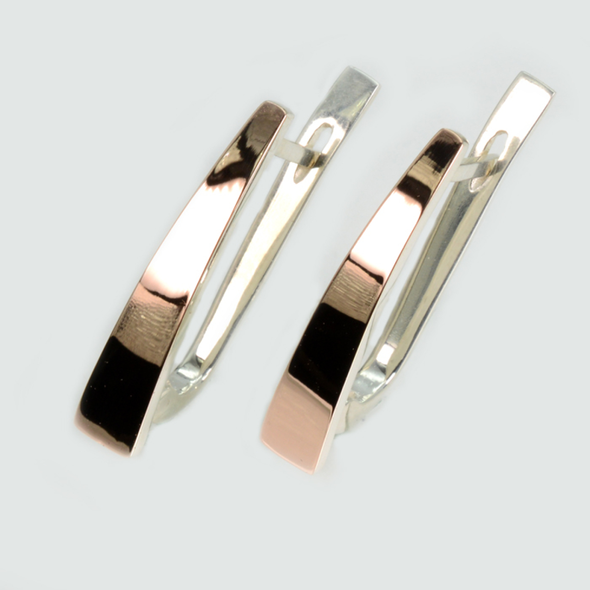 Срібні сережки з золотими пластинами