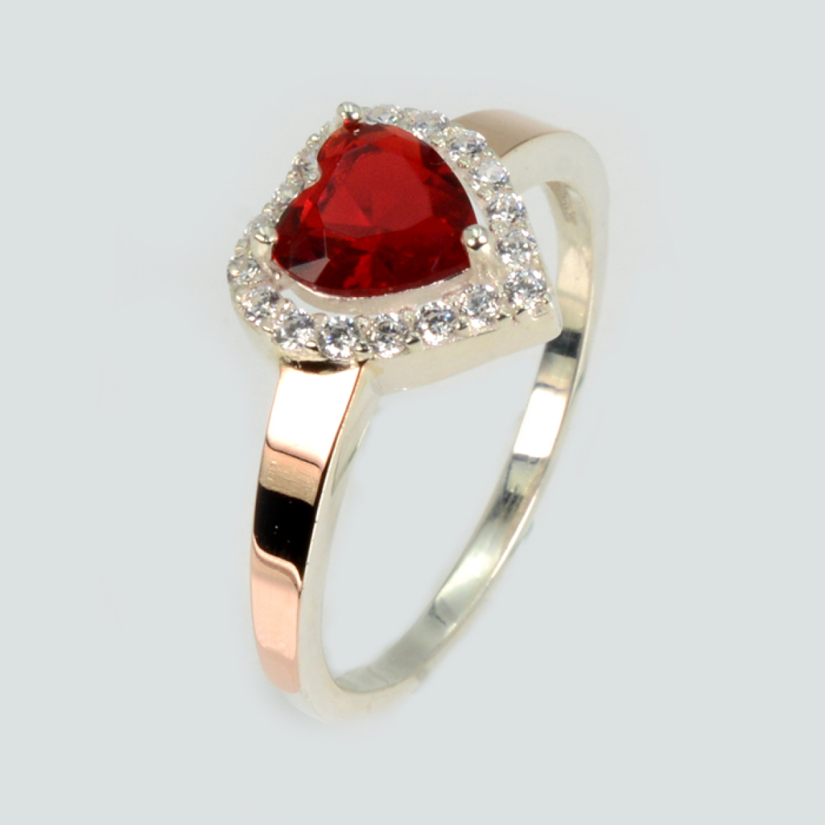 Срібна каблучка з золотими вставками