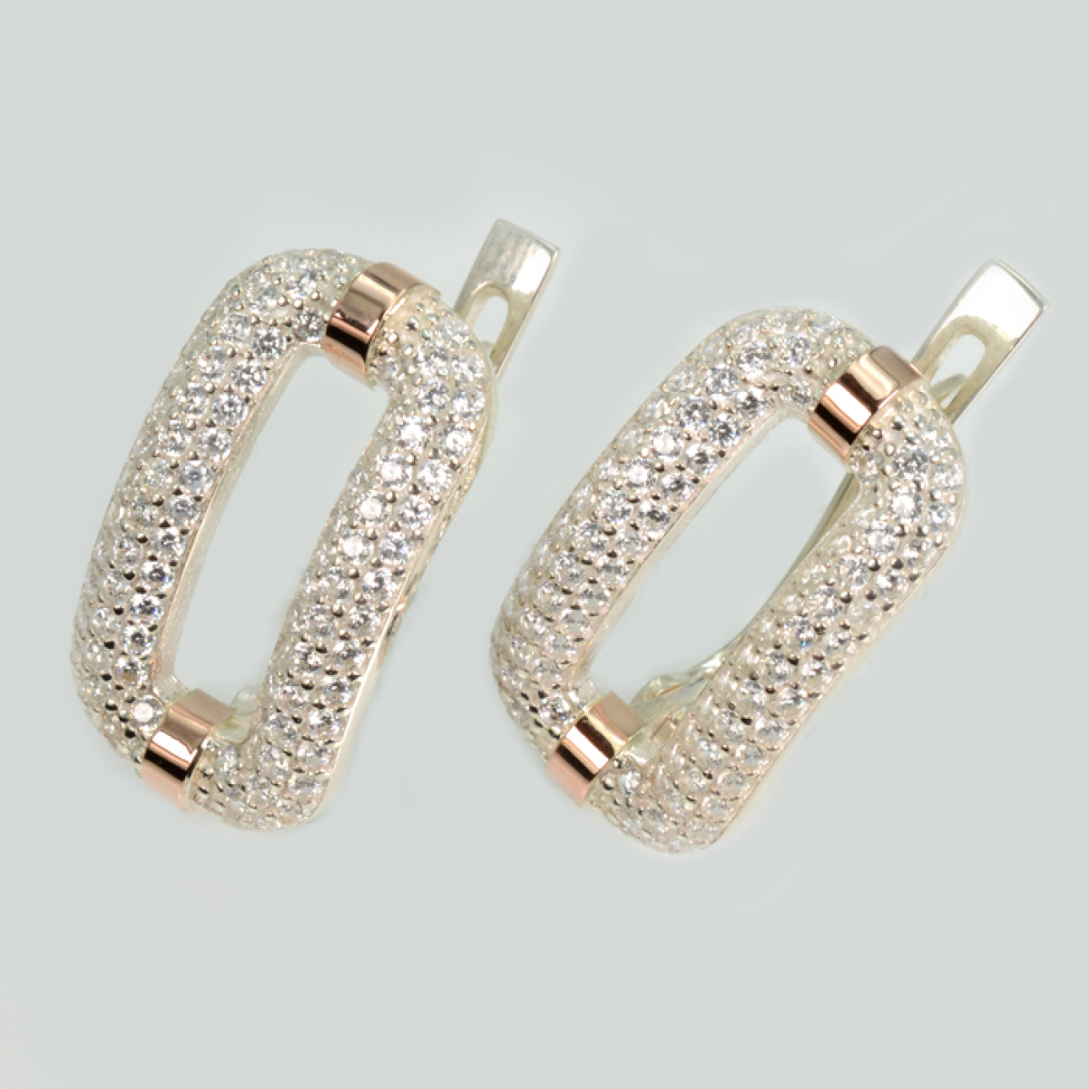 Срібні сережки з золотими пластинами