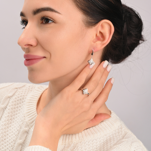 Серебряное кольцо с золотыми вставками